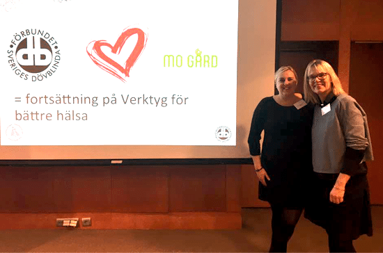Representanter från Mo Gård och FSDB framför en Powerpoint